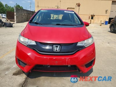 Piąte zdjęcie samochodu w środku: 2016 HONDA FIT LX VIN:JHMGK5H51GX017704 - miniatura