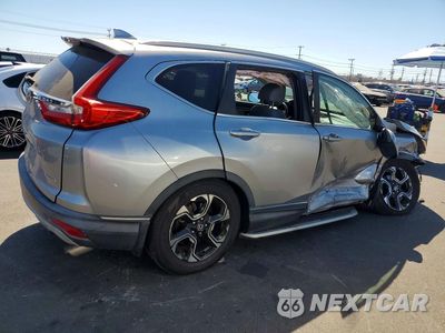 Trzecie zdjęcie samochodu z tyłu: 2017 HONDA CR-V TOURING VIN:2HKRW1H93HH505480 - miniatura