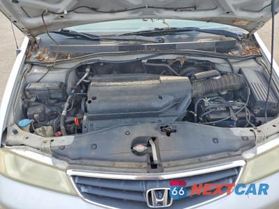 Zdjęcie 11 z 12 samochodu: 2002 HONDA ODYSSEY LX VIN:2HKRL18562H549177 - miniatura