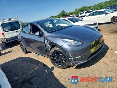 Czwarte zdjęcie samochodu z boku: 2022 TESLA MODEL Y VIN:7SAYGDEE9NA009301 - miniatura