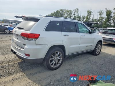 Trzecie zdjęcie samochodu z tyłu: 2014 JEEP GRAND CHEROKEE SUMMIT VIN:1C4RJFJM9EC300036 - miniatura