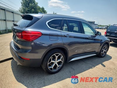 Trzecie zdjęcie samochodu z tyłu: 2018 BMW X1 XDRIVE28I VIN:WBXHT3C30J5K25396 - miniatura