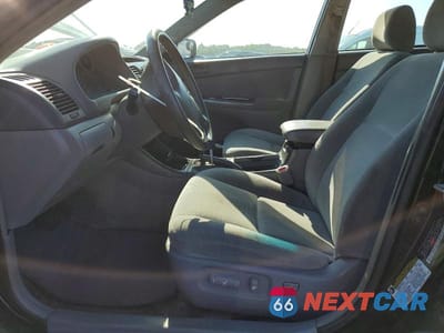 Zdjęcie 7 z 12 samochodu: 2004 TOYOTA CAMRY LE VIN:4T1BE32K94U318414 - miniatura