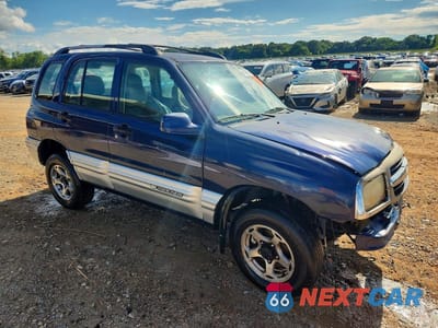 Czwarte zdjęcie samochodu z boku: 2001 CHEVROLET TRACKER LT VIN:2CNBJ634116942151 - miniatura