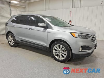 Czwarte zdjęcie samochodu z boku: 2022 FORD EDGE TITANIUM VIN:2FMPK4K95NBA35730 - miniatura