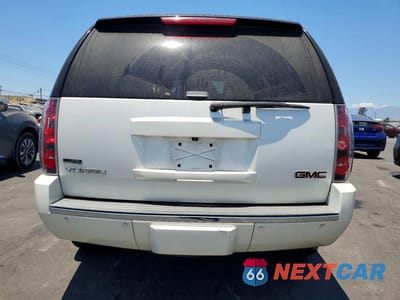 Zdjęcie 6 z 13 samochodu: 2011 GMC YUKON DENALI VIN:1GKS2EEF4BR109254 - miniatura