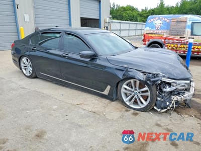 Czwarte zdjęcie samochodu z boku: 2018 BMW 750 XI VIN:WBA7F2C54JG424075 - miniatura