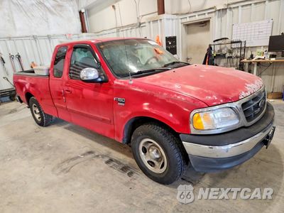 Czwarte zdjęcie samochodu z boku: 2000 FORD F150 VIN:1FTRX17W8YNA68192 - miniatura