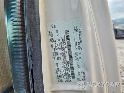 Zdjęcie 13 z 13 samochodu: 2009 FORD ECONOLINE E350 SUPER DUTY WAGON VIN:1FBNE31L99DA58913 - miniatura