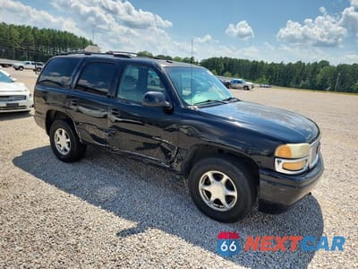 Czwarte zdjęcie samochodu z boku: 2003 GMC YUKON DENALI VIN:1GKEK63U73J165760 - miniatura
