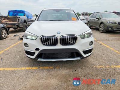 Piąte zdjęcie samochodu w środku: 2018 BMW X1 XDRIVE28I VIN:WBXHT3C32J5K31037 - miniatura