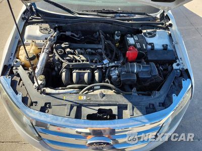 Zdjęcie 11 z 12 samochodu: 2012 FORD FUSION S VIN:3FAHP0GA4CR350593 - miniatura