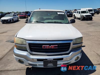 Piąte zdjęcie samochodu w środku: 2005 GMC NEW SIERRA C1500 VIN:2GTEC13T251155881 - miniatura