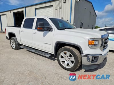 Czwarte zdjęcie samochodu z boku: 2015 GMC SIERRA C1500 SLE VIN:3GTU1UEC9FG201800 - miniatura