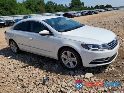 Czwarte zdjęcie samochodu z boku: 2013 VOLKSWAGEN CC SPORT VIN:WVWBN7AN1DE508080 - miniatura