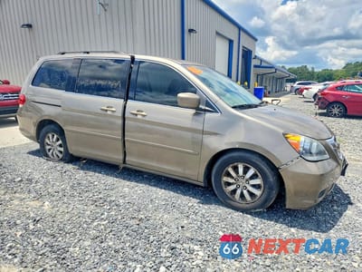 Czwarte zdjęcie samochodu z boku: 2010 HONDA ODYSSEY EXL VIN:5FNRL3H78AB048043 - miniatura