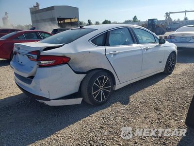 Trzecie zdjęcie samochodu z tyłu: 2017 FORD FUSION SE PHEV VIN:3FA6P0PU3HR124974 - miniatura