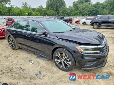 Czwarte zdjęcie samochodu z boku: 2021 VOLKSWAGEN PASSAT SE VIN:1VWSA7A3XMC015548 - miniatura