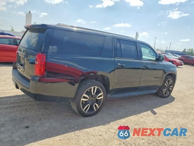 Trzecie zdjęcie samochodu z tyłu: 2020 CHEVROLET SUBURBAN K1500 PREMIER VIN:1GNSKJKJ5LR143970 - miniatura