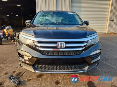 Piąte zdjęcie samochodu w środku: 2017 HONDA PILOT TOURING VIN:5FNYF6H93HB024328 - miniatura