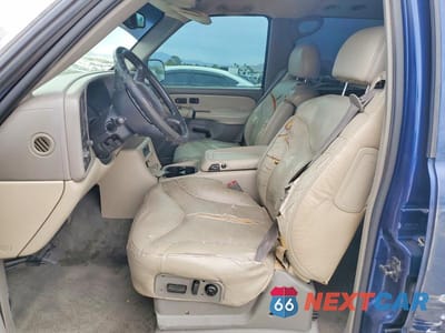 Zdjęcie 7 z 13 samochodu: 2001 GMC YUKON XL C1500 VIN:1GKEC16T41J311029 - miniatura