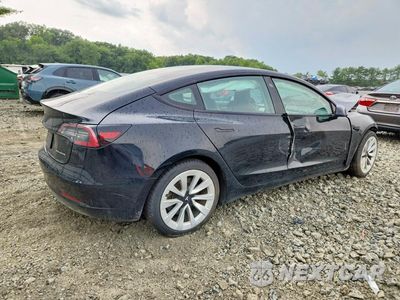Trzecie zdjęcie samochodu z tyłu: 2023 TESLA MODEL 3 VIN:5YJ3E1EB1PF389922 - miniatura