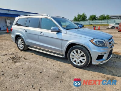 Czwarte zdjęcie samochodu z boku: 2014 MERCEDES-BENZ GL 550 4MATIC VIN:4JGDF7DE1EA336820 - miniatura