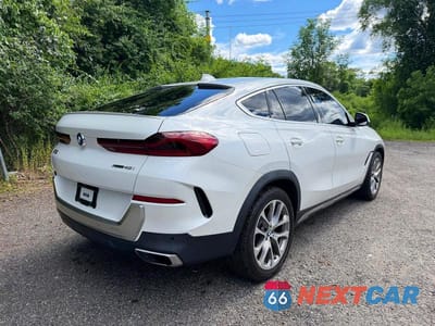 Czwarte zdjęcie samochodu z boku: 2020 BMW X6 XDRIVE40I VIN:5UXCY6C0XL9D21128 - miniatura