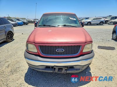 Piąte zdjęcie samochodu w środku: 1999 FORD F150 VIN:1FTRX17L6XKA54166 - miniatura