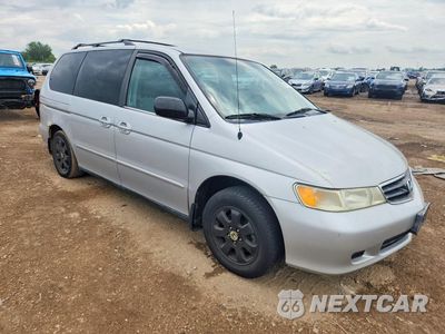 Czwarte zdjęcie samochodu z boku: 2002 HONDA ODYSSEY EX VIN:2HKRL18642H517479 - miniatura