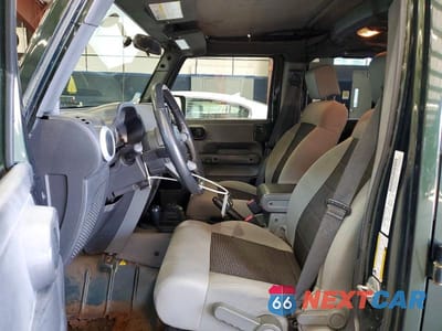 Zdjęcie 7 z 13 samochodu: 2010 JEEP WRANGLER UNLIMITED SAHARA VIN:1J4BA5H17AL167899 - miniatura