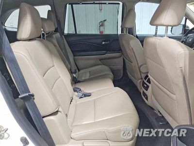 Zdjęcie 11 z 13 samochodu: 2017 HONDA PILOT TOURING VIN:5FNYF5H93HB021312 - miniatura