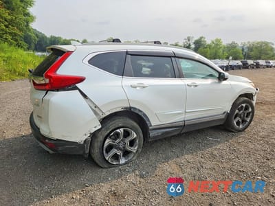 Trzecie zdjęcie samochodu z tyłu: 2017 HONDA CR-V TOURING VIN:5J6RW2H9XHL006641 - miniatura