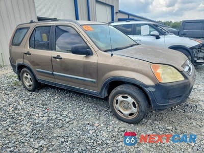 Czwarte zdjęcie samochodu z boku: 2004 HONDA CR-V LX VIN:JHLRD68414C023770 - miniatura