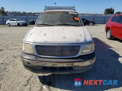 Piąte zdjęcie samochodu w środku: 1999 FORD F150 VIN:1FTZF1729XKA82814 - miniatura