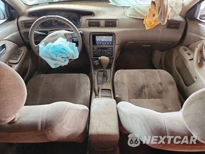 Zdjęcie 8 z 12 samochodu: 1997 TOYOTA CAMRY LE VIN:4T1BG22KXVU100455 - miniatura