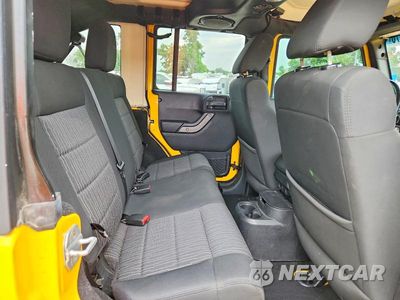 Zdjęcie 11 z 13 samochodu: 2011 JEEP WRANGLER UNLIMITED SPORT VIN:1J4BA3H17BL525430 - miniatura
