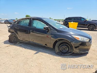 Czwarte zdjęcie samochodu z boku: 2017 FORD FOCUS S VIN:1FADP3E20HL330469 - miniatura