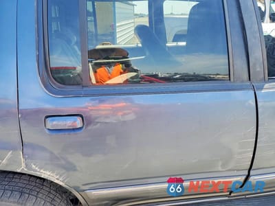 Zdjęcie 10 z 12 samochodu: 1999 FORD EXPLORER VIN:1FMZU34E6XZA39955 - miniatura