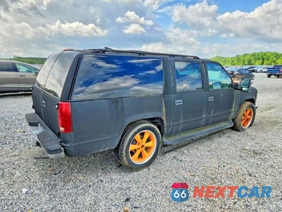 Trzecie zdjęcie samochodu z tyłu: 1998 CHEVROLET SUBURBAN K1500 VIN:1GNFK16R2WJ326084 - miniatura