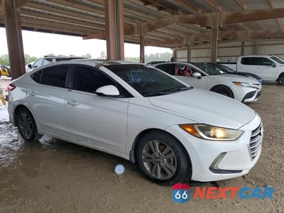 Czwarte zdjęcie samochodu z boku: 2018 HYUNDAI ELANTRA VALUE EDITION VIN:5NPD84LF2JH221797 - miniatura