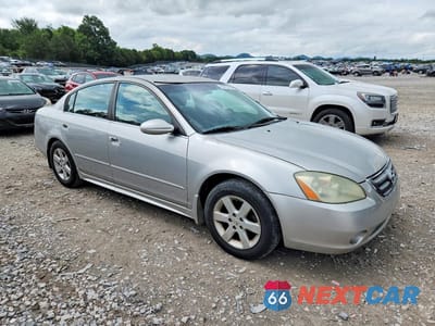 Czwarte zdjęcie samochodu z boku: 2003 NISSAN ALTIMA BASE/S/SL VIN:1N4AL11D63C331144 - miniatura