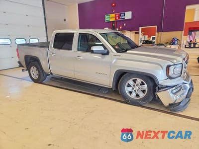 Czwarte zdjęcie samochodu z boku: 2018 GMC SIERRA K1500 SLE VIN:3GTU2MEC8JG147024 - miniatura