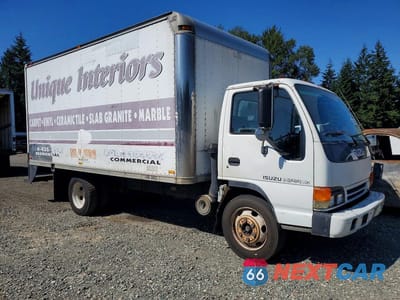 Czwarte zdjęcie samochodu z boku: 1999 ISUZU NPR BOX TRUCK VIN:4KLC4B1R0XJ004127 - miniatura