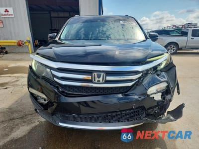 Piąte zdjęcie samochodu w środku: 2016 HONDA PILOT TOURING VIN:5FNYF5H92GB048306 - miniatura