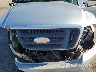 Zdjęcie 11 z 12 samochodu: 2006 FORD F150 VIN:1FTPX14586FA45988 - miniatura