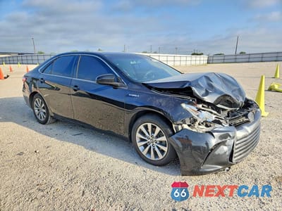 Czwarte zdjęcie samochodu z boku: 2016 TOYOTA CAMRY HYBRID XLE VIN:4T1BD1FK3GU187776 - miniatura