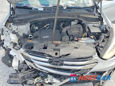 Zdjęcie 12 z 14 samochodu: 2016 HYUNDAI SANTA FE SPORT 2.4L VIN:5XYZU3LB9GG331819 - miniatura