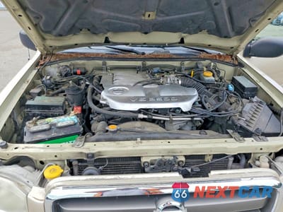 Zdjęcie 12 z 13 samochodu: 2002 NISSAN PATHFINDER SE VIN:JN8DR09X72W652187 - miniatura