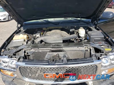 Zdjęcie 12 z 14 samochodu: 2006 GMC YUKON DENALI VIN:1GKEK63U16J134735 - miniatura